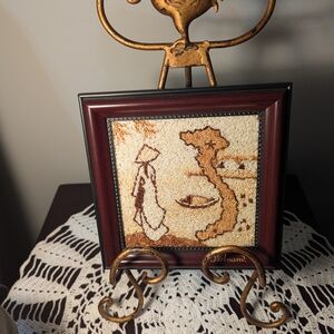 Intricate Embroidered Artwork in Wooden Frame
